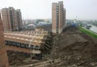 Imagine atasata: apartment-blocks-collapse-china-2-1.jpg